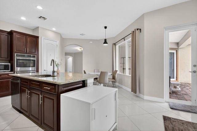 8850 Miralago Way, Parkland, FL 33076