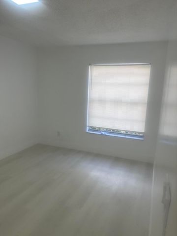 202 Sparrow Drive 1, Royal Palm Beach, FL 33411