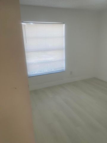 202 Sparrow Drive 1, Royal Palm Beach, FL 33411