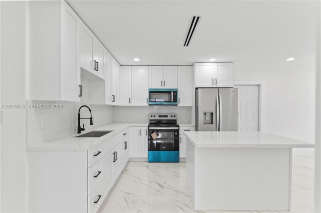 12035 SW 214th Terrace, Miami, FL 33177