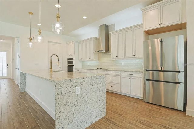 7038 ARNOLDSON STREET, Orlando, FL 32827