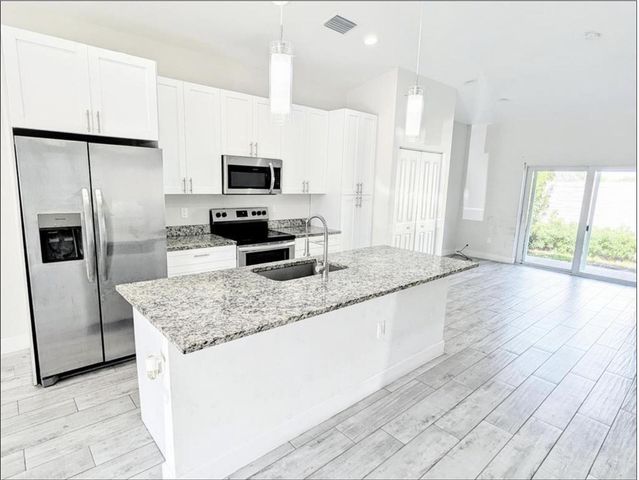 1562 W 26th Court, Riviera Beach, FL 33404