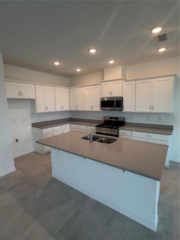 24546 HODGES RESERVE AVENUE, Howey In The Hills, FL 34737