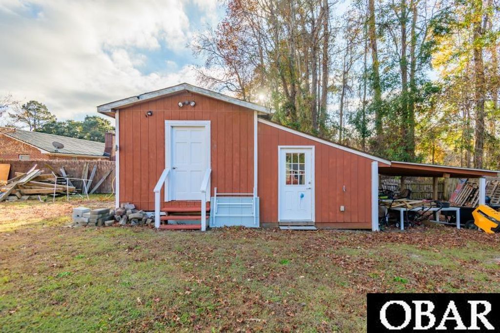 Image 48 of property listing at 173 Creefs Ridge Road Lot 13, Manteo, NC 27954