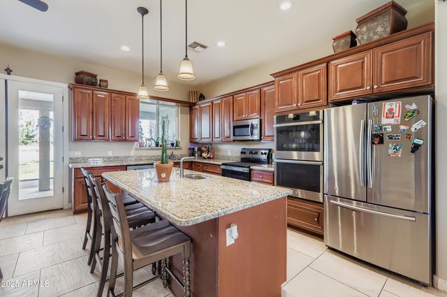 22136 W GAMBIT Trail, Wittmann, AZ 85361