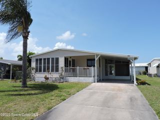 703 Draco Drive, Barefoot Bay, FL 32976