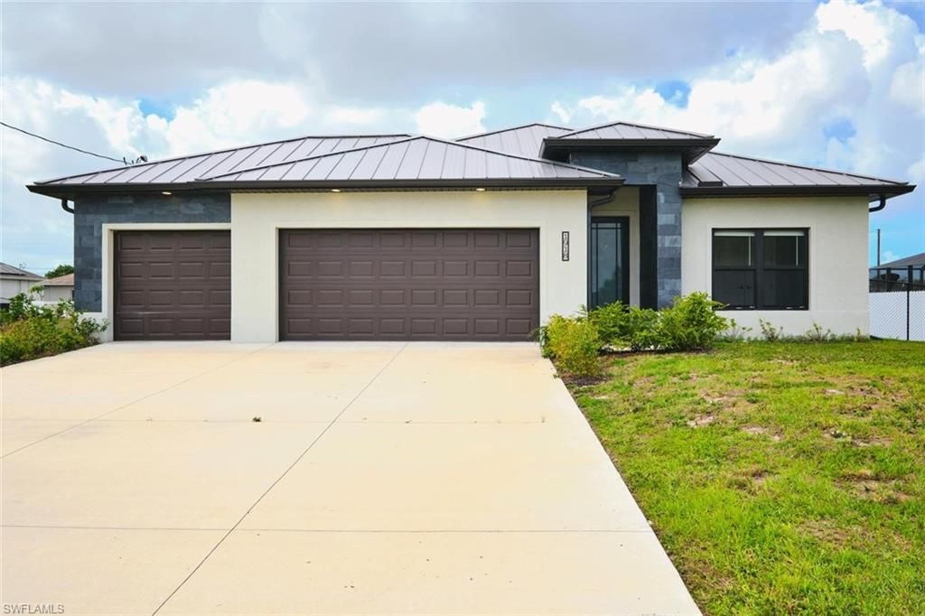 Image 1 of property listing at 1918 SW 1st ST, Cape Coral, FL 33991
