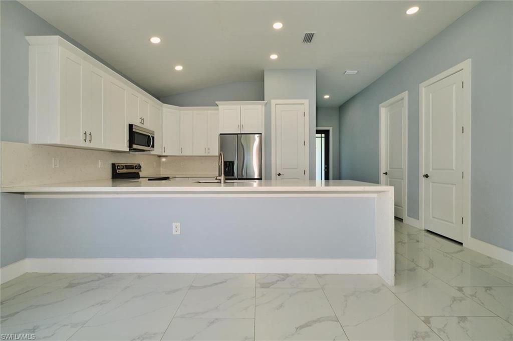 Image 9 of property listing at 1918 SW 1st ST, Cape Coral, FL 33991