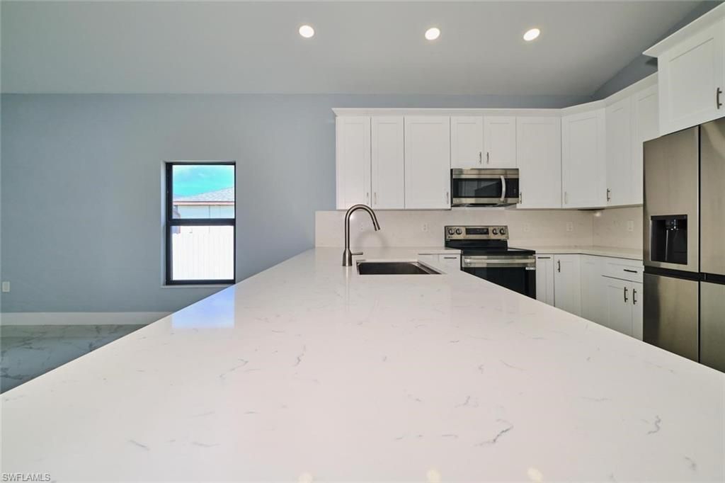 Image 10 of property listing at 1918 SW 1st ST, Cape Coral, FL 33991