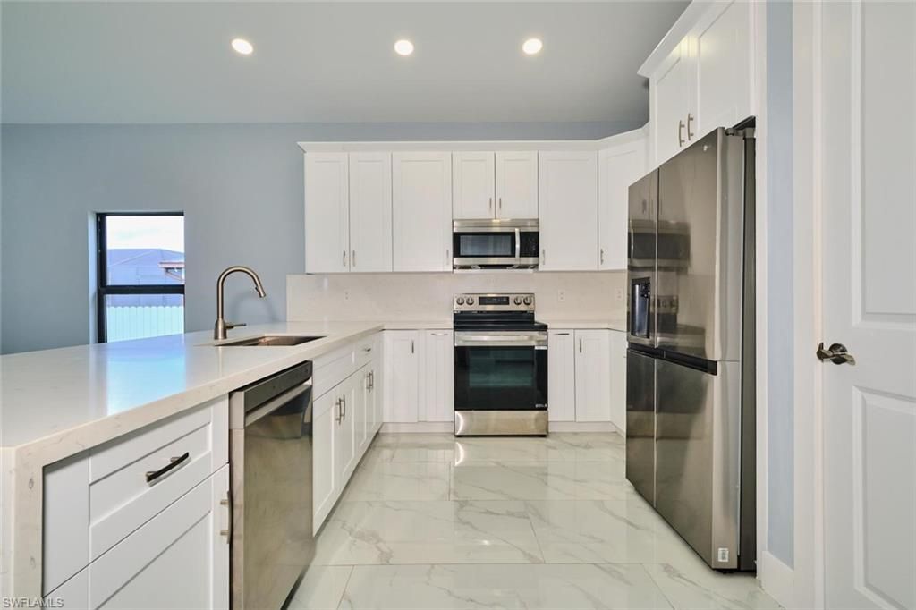 Image 11 of property listing at 1918 SW 1st ST, Cape Coral, FL 33991