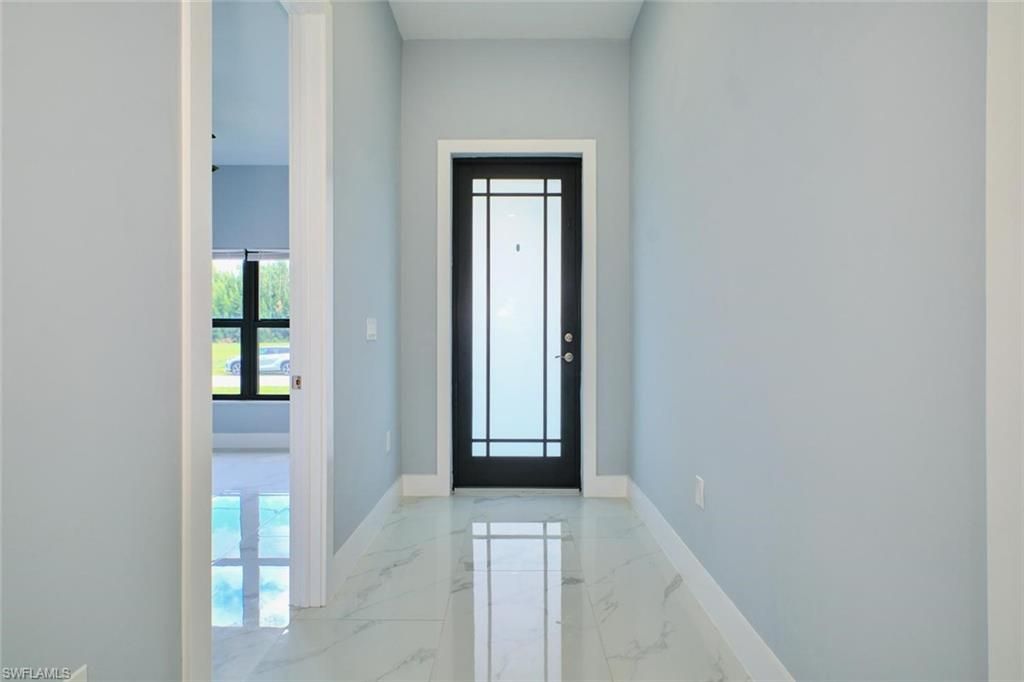 Image 3 of property listing at 1918 SW 1st ST, Cape Coral, FL 33991