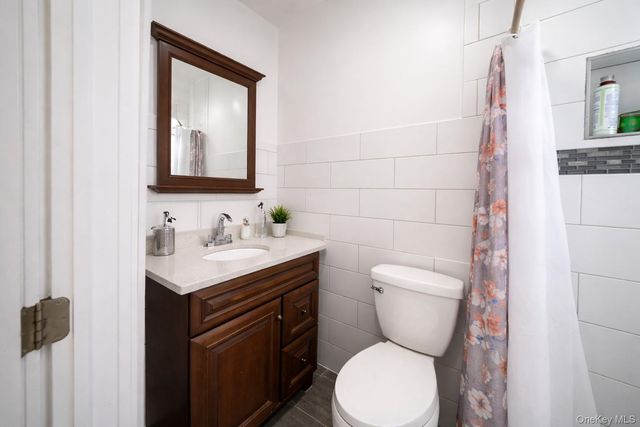 7037 72nd Place, Glendale, NY 11385