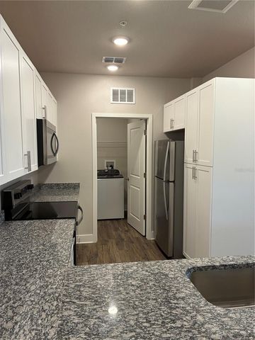 2280 WATERFALL COURT 4-302, Mount Dora, FL 32757