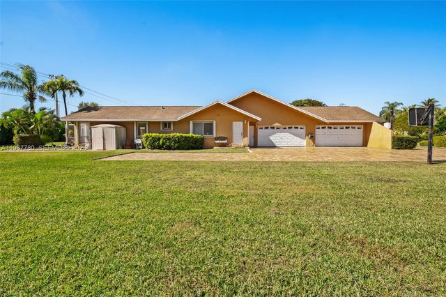 7720 SW 183rd Ter, Palmetto Bay, FL 33157