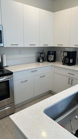 12221 NW 23rd Pl, Miami, FL 33167