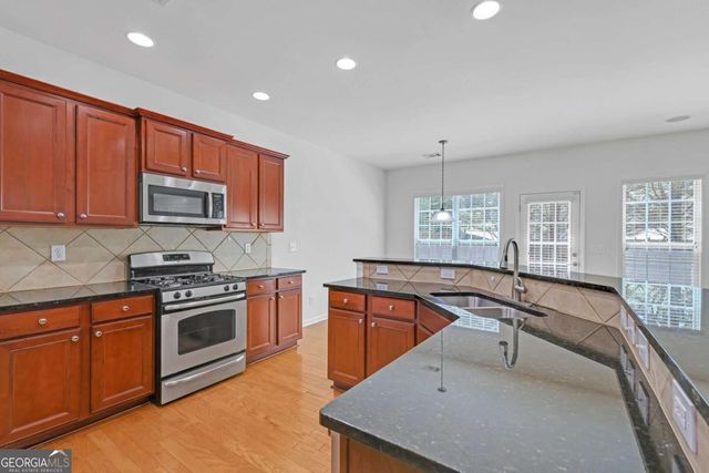 5608 Avonley Creek Drive, Sugar Hill, GA 30518