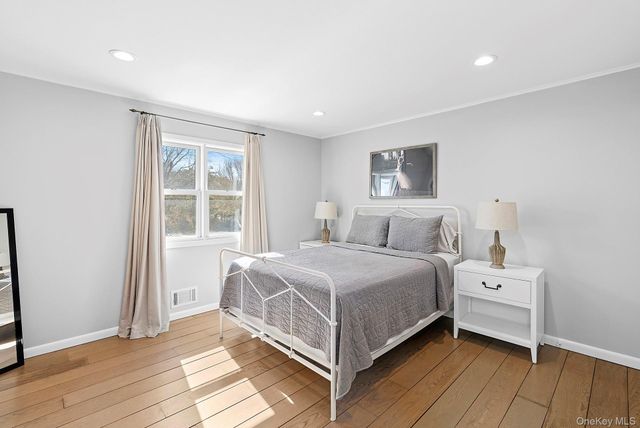 22 Peconic Crescent, Hampton Bays, NY 11946