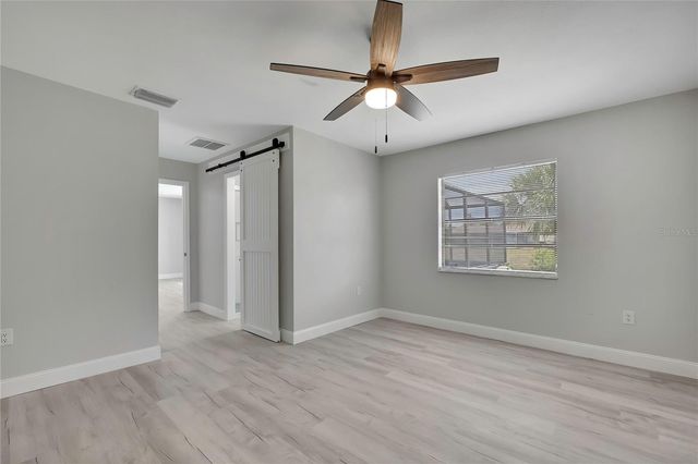 9312 LAKE CHRISTINA LANE, Port Richey, FL 34668