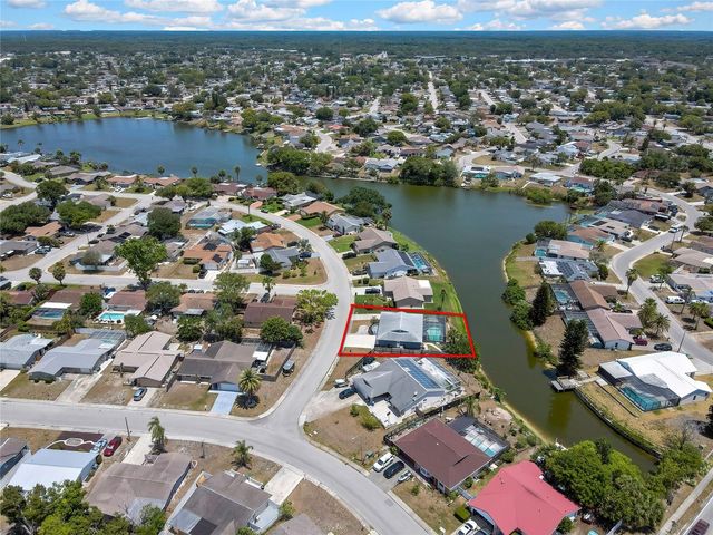 9312 LAKE CHRISTINA LANE, Port Richey, FL 34668