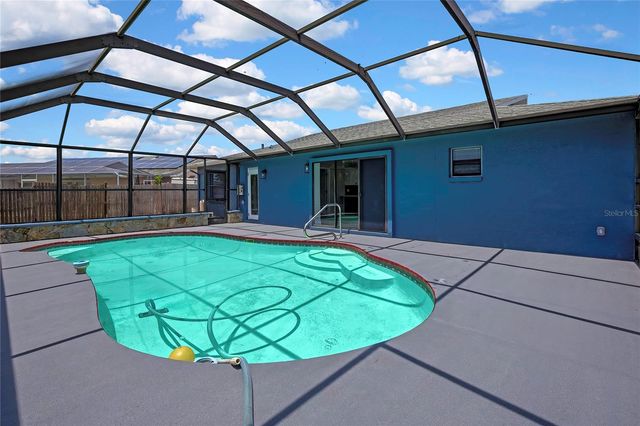 9312 LAKE CHRISTINA LANE, Port Richey, FL 34668