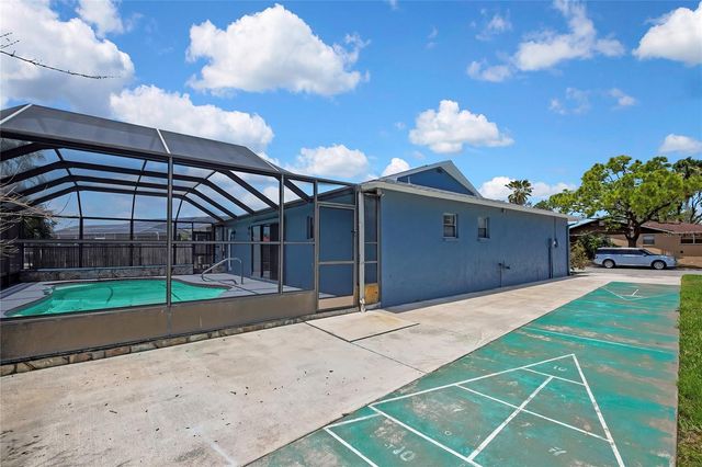 9312 LAKE CHRISTINA LANE, Port Richey, FL 34668
