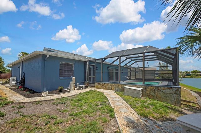 9312 LAKE CHRISTINA LANE, Port Richey, FL 34668
