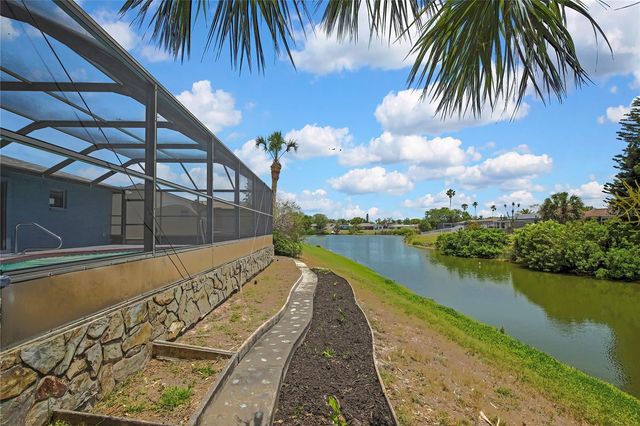 9312 LAKE CHRISTINA LANE, Port Richey, FL 34668