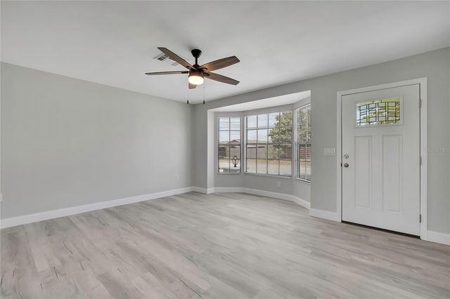 9312 LAKE CHRISTINA LANE, Port Richey, FL 34668