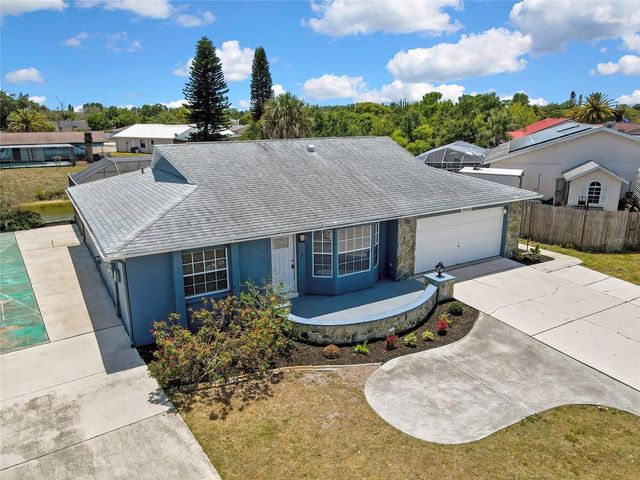 9312 LAKE CHRISTINA LANE, Port Richey, FL 34668