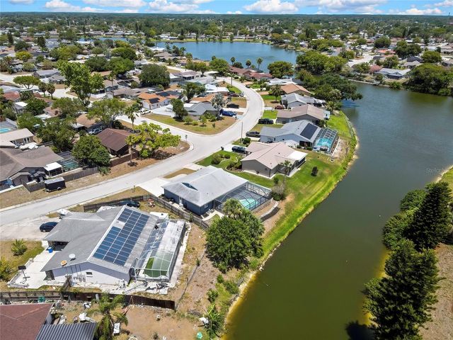 9312 LAKE CHRISTINA LANE, Port Richey, FL 34668
