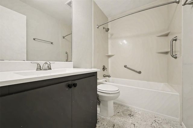 7734 LAKESIDE WOODS DRIVE, Orlando, FL 32810