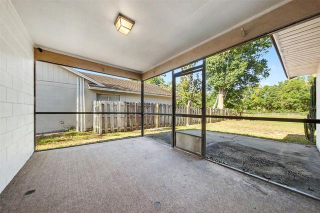 7734 LAKESIDE WOODS DRIVE, Orlando, FL 32810