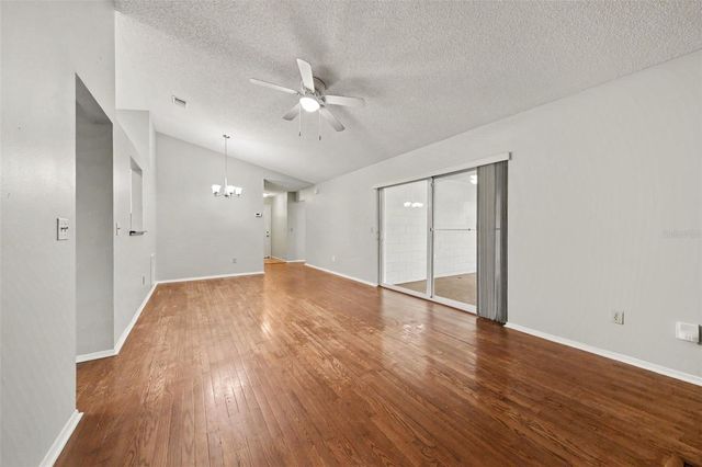 7734 LAKESIDE WOODS DRIVE, Orlando, FL 32810