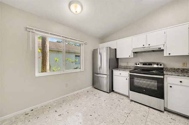 7734 LAKESIDE WOODS DRIVE, Orlando, FL 32810