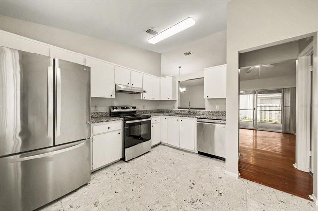 7734 LAKESIDE WOODS DRIVE, Orlando, FL 32810