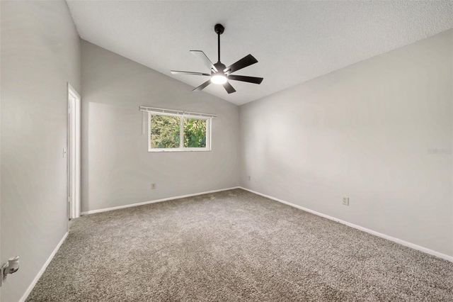 7734 LAKESIDE WOODS DRIVE, Orlando, FL 32810