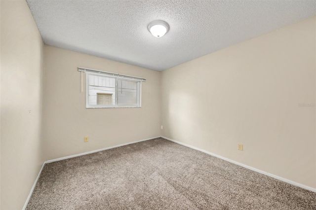 7734 LAKESIDE WOODS DRIVE, Orlando, FL 32810