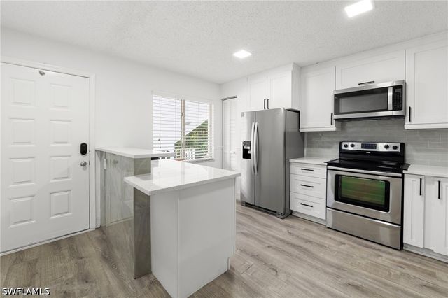 3451 County Barn RD 203, Naples, FL 34112