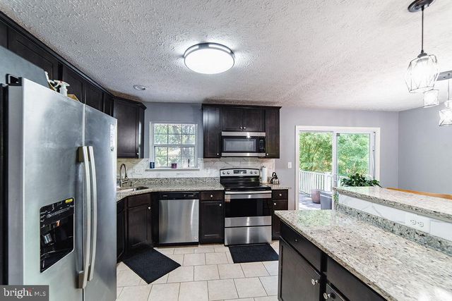7711 HARMANS RD, Hanover, MD 21076