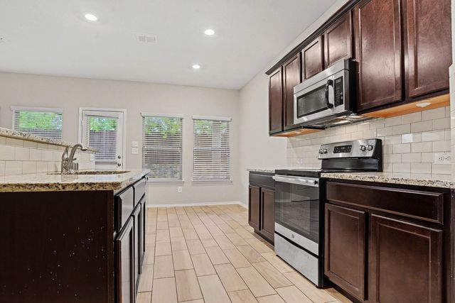 1009 N Churchill Drive, Fate, TX 75189
