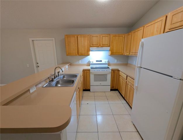 3303 E FRIERSON AVENUE, Tampa, FL 33610