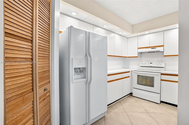 12701 SW 14th St 402J, Pembroke Pines, FL 33027