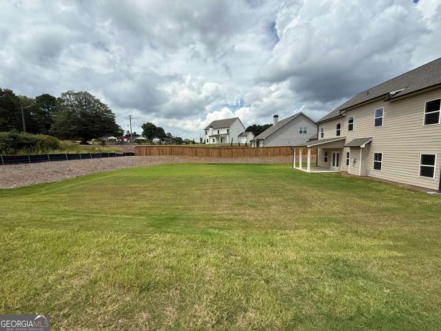 76 HIDDEN FIELDS Way, Hoschton, GA 30548