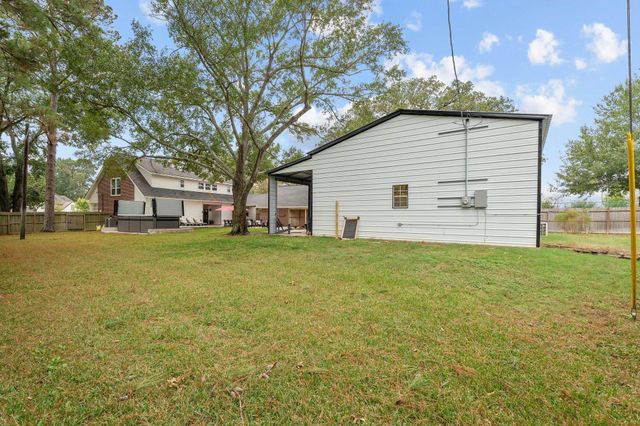 12955 Point Aquarius Boulevard, Willis, TX 77318