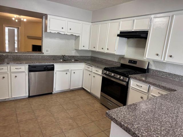 9507 Braeburn Glen Boulevard, Houston, TX 77074