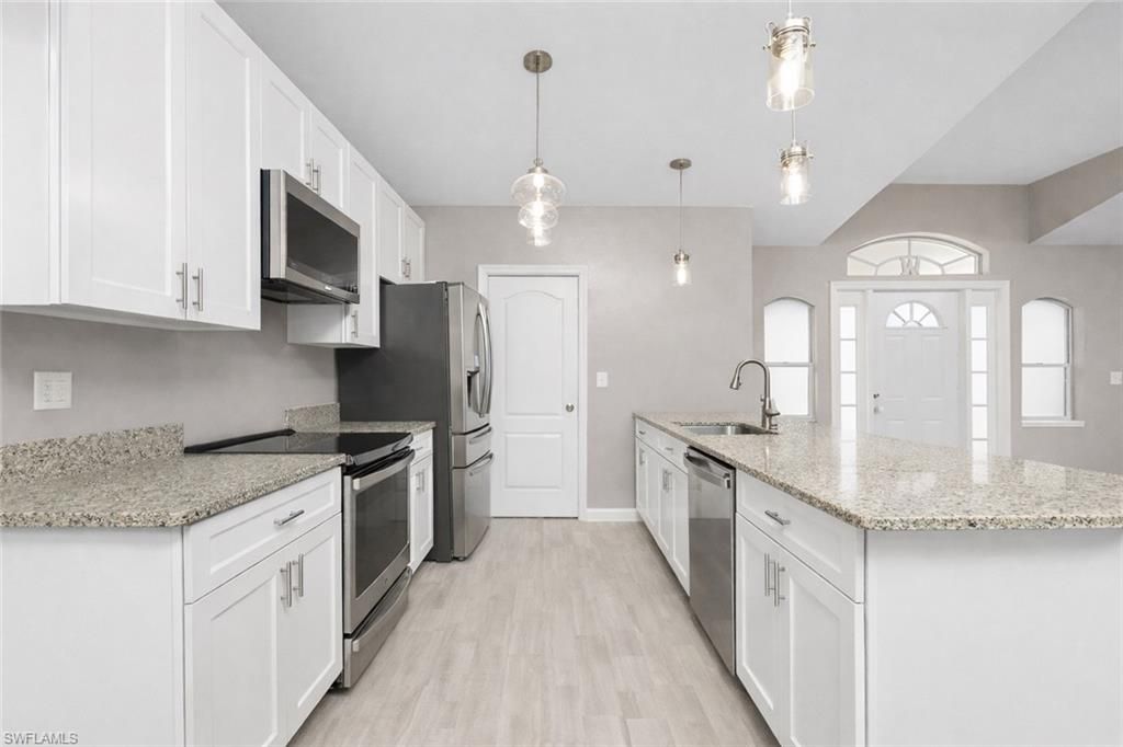 228 NW 29th AVE, CAPE CORAL, FL 33993 — photo 4