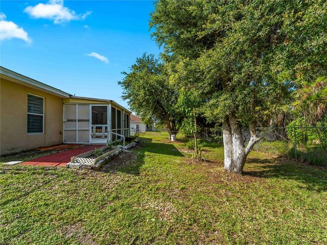 1103 LEE AVENUE, Lehigh Acres, FL 33972