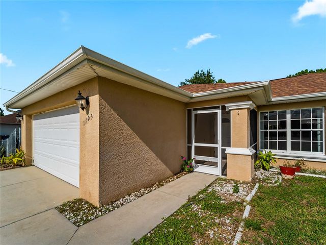 1103 LEE AVENUE, Lehigh Acres, FL 33972