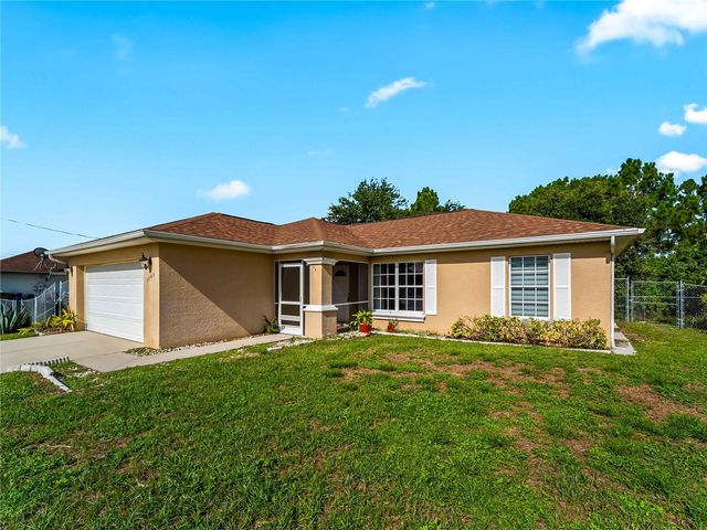 1103 LEE AVENUE, Lehigh Acres, FL 33972