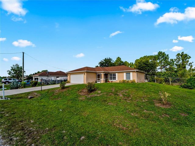 1103 LEE AVENUE, Lehigh Acres, FL 33972